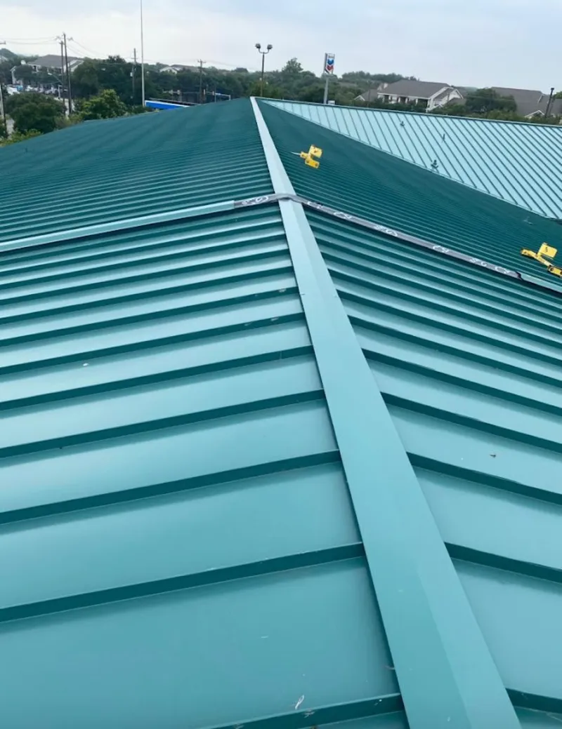 Green commercial metal roof ridge and valley for Metal Roof Repair in Wisconsin Rapids